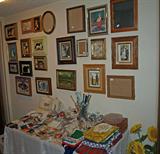 numerous picture frames, sewing