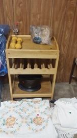 Wooden wine rack on wheels with detachable tray on top.  This will go quick!