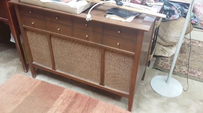 We have 3 old radio/vinyl album consoles for sell. These are antique and awesome looking for Mid Century Modern style.  All 3 work! Priced to sell.