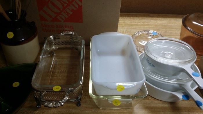Loaf pans, one with silver stand, casserole dishes