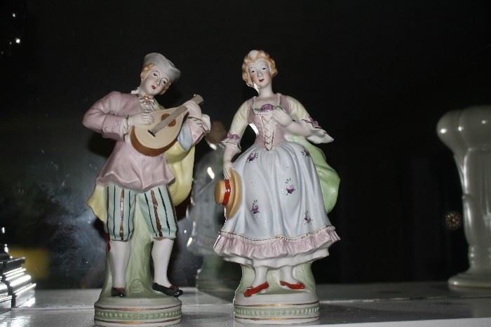Porcelain pastoral figurines.  