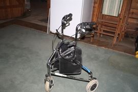 3-Wheeled Roll Easy Walker, gently used. Good for maneuvering in small places.