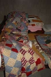 Several Machine Made Patchwork Quilts