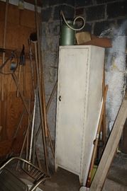 Old Metal Cabinet, great for basement or garage.  A variety of tools for the garden or yard or workshop.