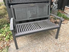 Teak garden bench painted a soft brown color