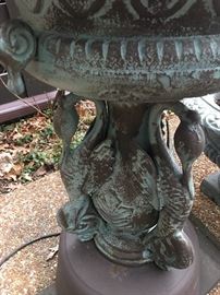 Closeup of metal garden urn