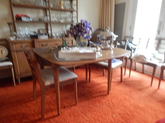 Mid century dining table with six chairs...I think early 1950's. Looks just like the table my mother had!