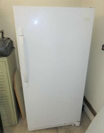 White Standup Frigidaire Freezer