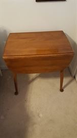Drop leaf Side table with glass top.