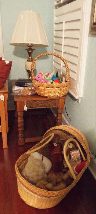 Side table & baskets of stuffed toys