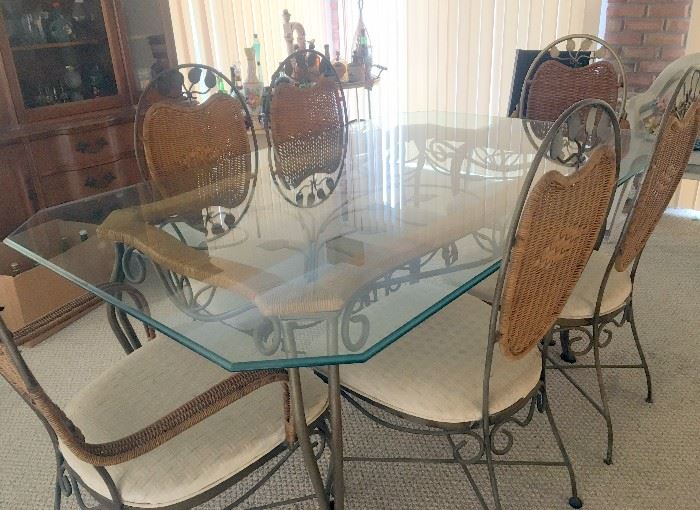 Very nice glass top sun room table and chairs