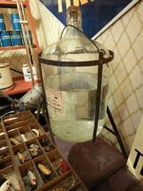 VINTAGE DISTILLED WATER BOTTLE IN STAND