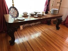 Unusual 7 ft. long custom made console table, legs are reclaimed from a Victorian grand piano 