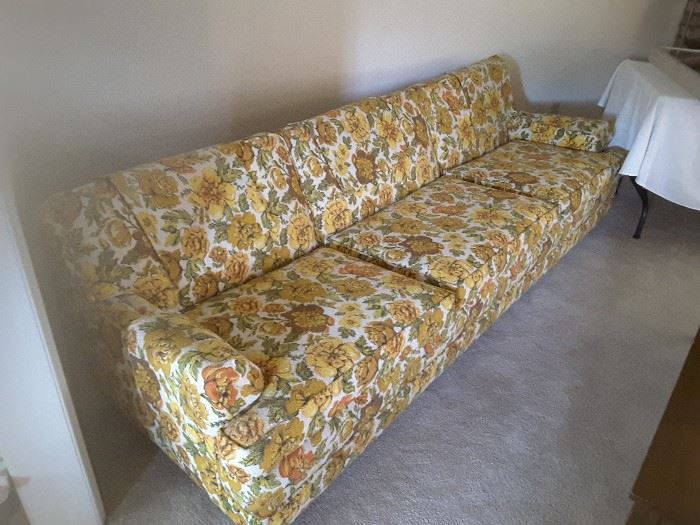 Full Length view of the Vintage flowered couch.