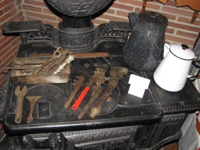 "Radiant Home" antique cast iron stove.  It was originally part of the Meadowdale 1-room schoolhouse.  vintage tools