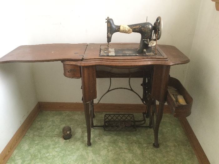 Treadle sewing machine, missing drawers available.