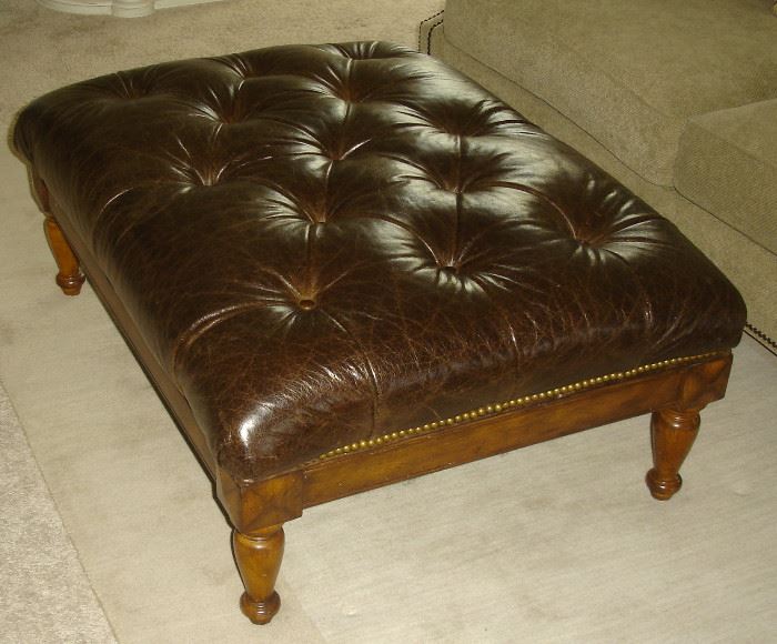 Leather ottoman with secret drawer