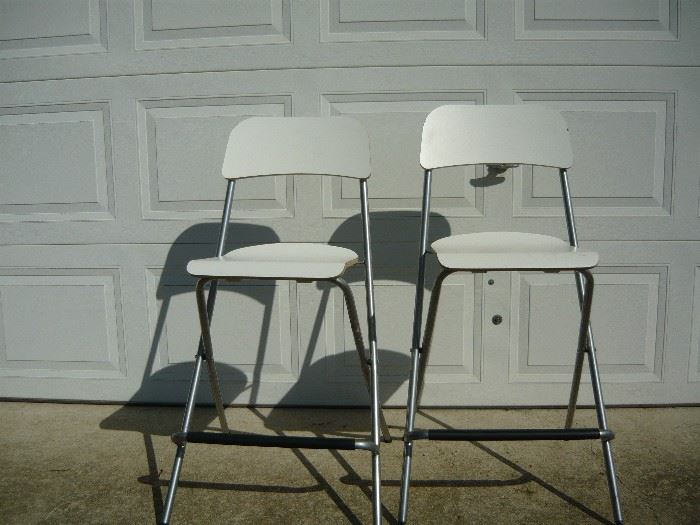 Pair of tall folding chairs for extra company