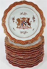 Set of 12 Hand-Painted Armorial Porcelain Plates with lion, shield, and bull with gilt trim. 9 white and 3 pale celadon porcelain. Hand painted. Crest with Lion and Bull Chinese Export