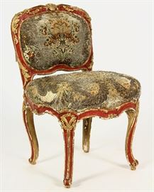 Louis XV Gilt wood Child's Chair, molded wood, carved, lacquered red and partially gilded, the backrest surmounted by a shell
flanked by volutes and garlands of flowers, the eventful belt resting on winding feet, garniture of silver-embroidered fabric with flower
motifs and probably eighteenth century foliag