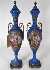 Pair of Blue Sevres Style Urn, 19th - 20th C., Portrait Medallion, transfer country scenes of men and women, gilt trim with bronze fittings.