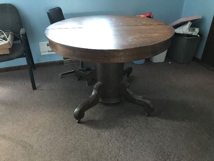 44"x45" round table with extending leaves to make it a 45"x87"  