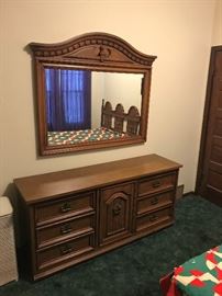 3 Piece bedroom set Mirror, 6 drawer with center shelves and the Headboard