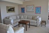 Beautiful nearly new sectional sleeper sofa, oak side table, white leather chair