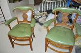 Pair of green leather chairs