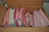 Large selection of pink table cloths and napkins.
Lots of other table linens.