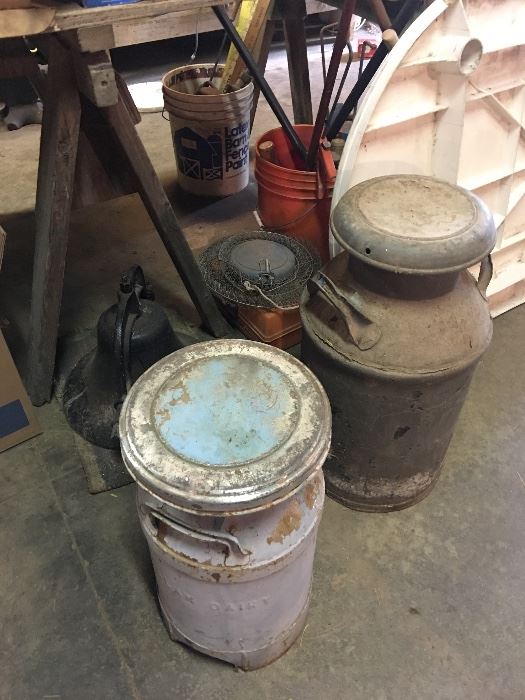 SEVERAL OLD MILK CANS