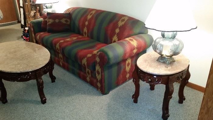 Marble top cherry finish coffee table with two end tables and console table. 
