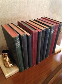 Collection of hymnals; baby shoe bookends