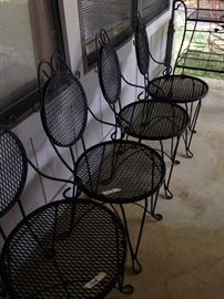 Four matching patio chairs