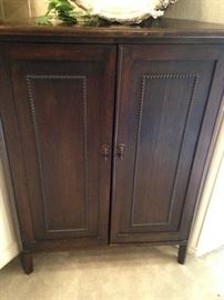 Unique antique corner cabinet