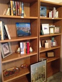 Book cases, books, frames, and other decor