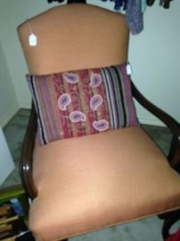 Orange upholstered arm chair