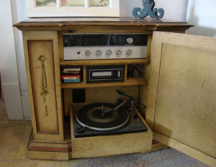 Stereo Cabinet with AM FM, 8 Track, and Record Player....AM FM works