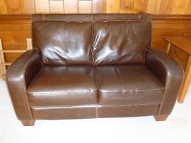 Leather? Loveseat..like new