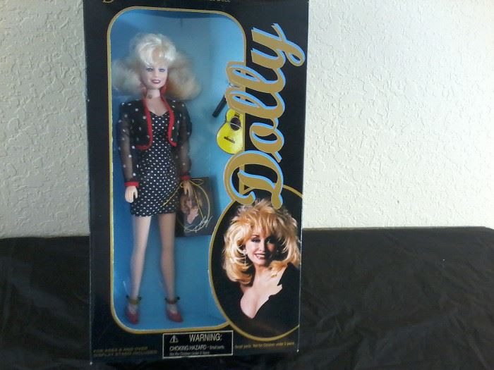 3 Dolls: 2 Lucille Ball, 1 Dolly Parton   http://www.ctonlineauctions.com/detail.asp?id=704322