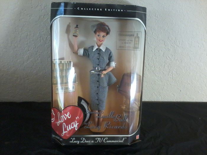 3 Dolls: 2 Lucille Ball, 1 Dolly Parton   http://www.ctonlineauctions.com/detail.asp?id=704322