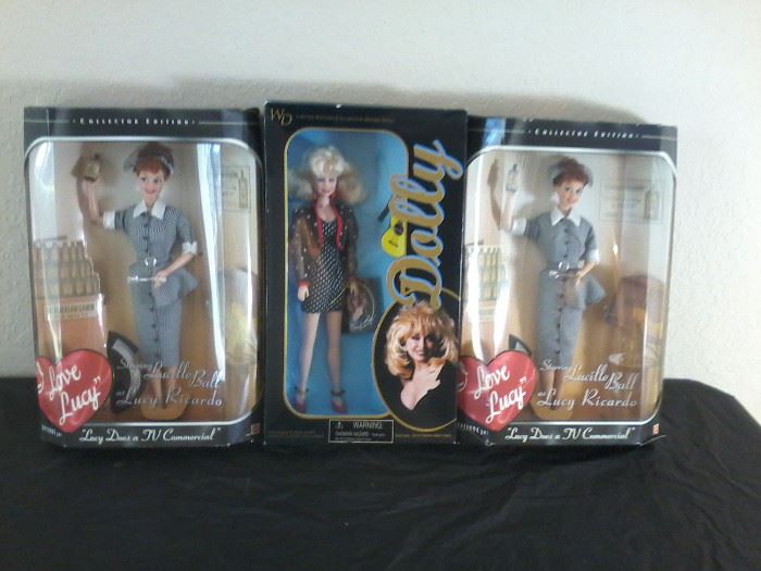  3 Dolls: 2 Lucille Ball, 1 Dolly Parton   http://www.ctonlineauctions.com/detail.asp?id=704322