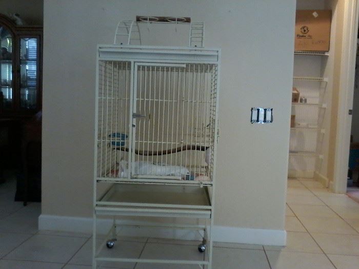 White Birdcage and Supplies   http://www.ctonlineauctions.com/detail.asp?id=704430