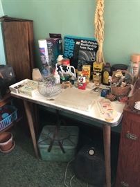 Assorted kitchen items and small table with ‘boomerang’ laminate top, tin picnic box, space heater