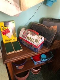 Wood shelf, Assorted pots, Lunch boxes and old jock straps in boxes