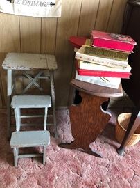 Vintage candy boxes and old kitchen stool