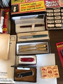 Assorted pen/pencil sets, Swiss Army knife and lighter