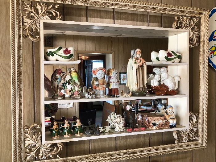 Figurines and Mid Century Mirrored Wall display 