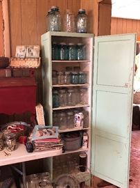 Craft and Knitting books, Zinc lids, old canning jars, pantry cabinet