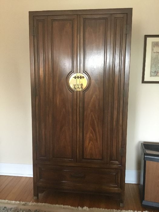Oriental armoire. Solid brass hardware. 5 drawers and 4 compartments. Pristine condition! $1200